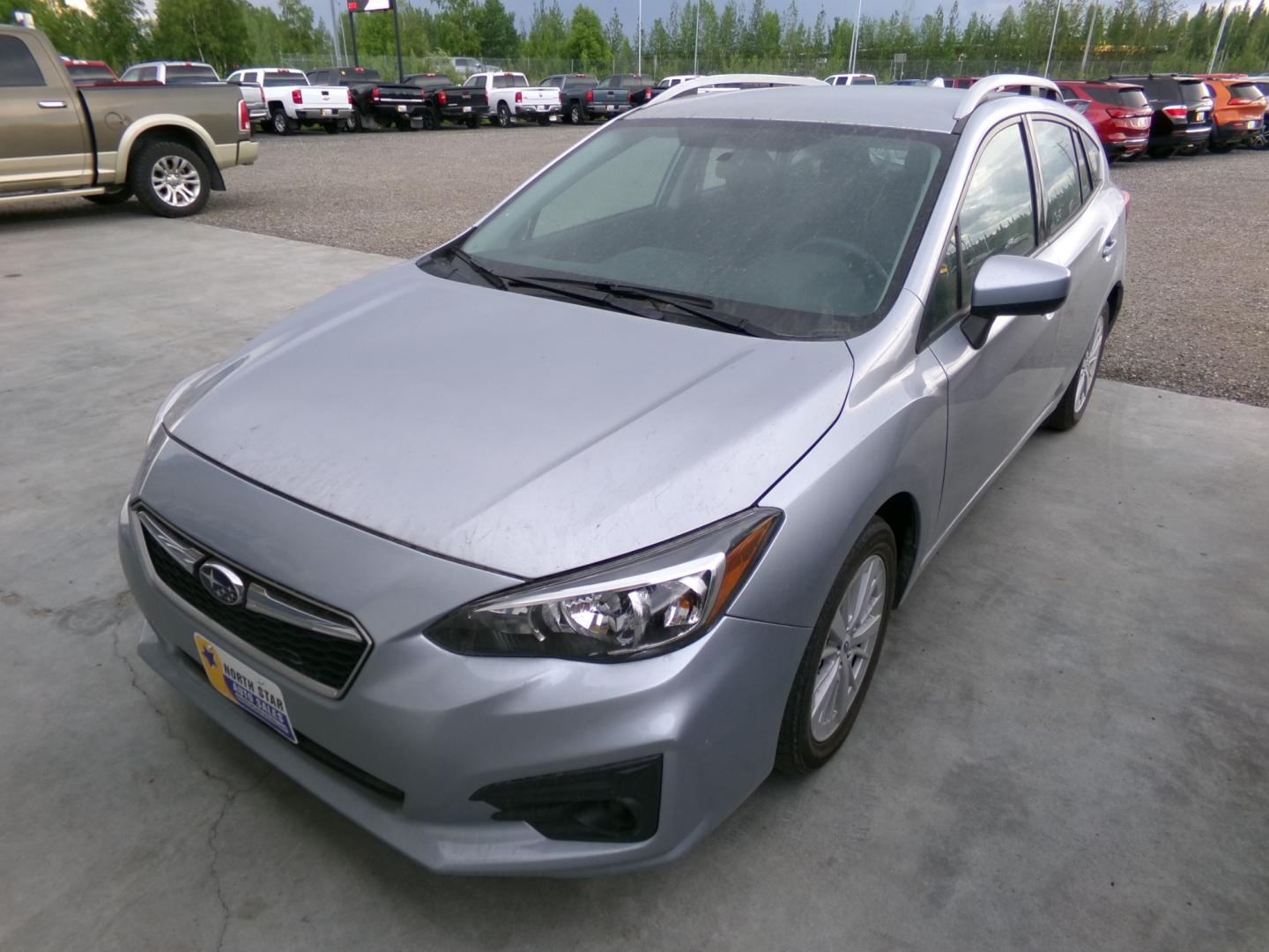 2017 Silver Subaru Impreza 2.0i Premium CVT 5-Door (4S3GTAB61H3) with an 2.0L H4 DOHC 16V engine, CVT transmission, located at 2630 Philips Field Rd., Fairbanks, AK, 99709, (907) 458-0593, 64.848068, -147.780609 - Photo#0